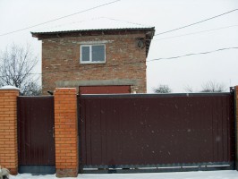 Ворота откатные из профнастила "Прушиньски" в Городне